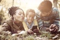 Happy African American little girl taking self picture in park o Royalty Free Stock Photo