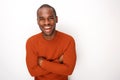 Happy african american man with arms crossed against isolated white background Royalty Free Stock Photo