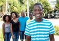 Happy african american man with group of people from Africa Royalty Free Stock Photo