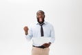 Happy African American man holding documaent paper over isolated white background with a surprise and shock face