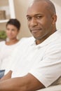 Happy African American Man Sitting At Home Royalty Free Stock Photo