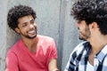 Happy african american man talking with friend Royalty Free Stock Photo