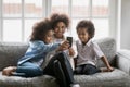 Happy African American mom and two cute children Royalty Free Stock Photo