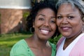 Happy African American mother and her daugher. Royalty Free Stock Photo