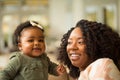 Happy African American mother and her daugher. Royalty Free Stock Photo