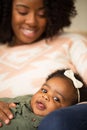 Happy African American mother and her daugher. Royalty Free Stock Photo