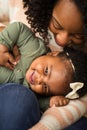 Happy African American mother and her daugher. Royalty Free Stock Photo