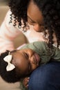 Happy African American mother and her daugher. Royalty Free Stock Photo