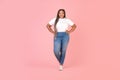 Happy African American Oversized Black Woman Standing Over Pink Background