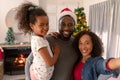 Happy african american parents and daughter taking selfie Royalty Free Stock Photo