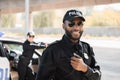 Happy african american police officer looking Royalty Free Stock Photo