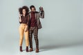 happy african american retro styled couple with vintage radio Royalty Free Stock Photo