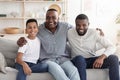 Happy African American Son, Father And Grandfather Bonding Together At Home Royalty Free Stock Photo