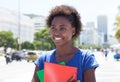 Happy african american student in the city Royalty Free Stock Photo