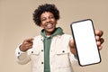 Happy African American student showing big mock up mobile phone screen. Royalty Free Stock Photo