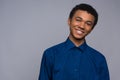 Happy African American teenager in denim shirt. Royalty Free Stock Photo