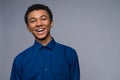 Happy African American teenager in denim shirt. Royalty Free Stock Photo