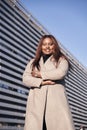 Happy African American woman business leader CEO chief executive standing in front of company building Royalty Free Stock Photo