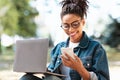 Happy African American Woman With Cellphone Texting Working Outside Royalty Free Stock Photo