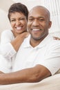 Happy African American Woman Couple Sitting At Home Royalty Free Stock Photo