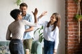 Happy African American woman giving high five with friend Royalty Free Stock Photo