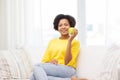 Happy african american woman with green apple Royalty Free Stock Photo