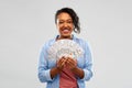 Happy african american woman holding dollar money Royalty Free Stock Photo