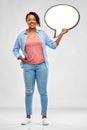 Happy african american woman holding speech bubble Royalty Free Stock Photo