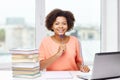 Happy african american woman with laptop at home Royalty Free Stock Photo