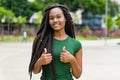 Happy african american young adult woman with amazing hairstyle Royalty Free Stock Photo