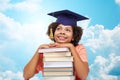 Happy african bachelor girl with books over sky Royalty Free Stock Photo
