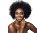 Happy African Beauty Model Face with Afro Hairstyle. Cheerful smiling Woman with Dark Skin and Black Curly Hair over White Royalty Free Stock Photo