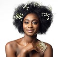 Happy African Beauty Model Face Portrait with White Flower in Afro Hair Style. Woman with Black Hair enjoying Body Skin Care Spa Royalty Free Stock Photo