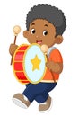 a happy african boy playing a big drum musical instrument Royalty Free Stock Photo