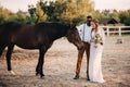 Interracial couple newlyweds at the ranch. Royalty Free Stock Photo