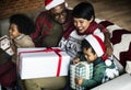 Happy African family celebrating with christmas gifts Royalty Free Stock Photo