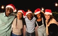 Happy African family celebrating Christmas holidays together at house rooftop Royalty Free Stock Photo