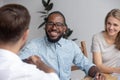 Happy african hr recruit handshake hire candidate at job interview Royalty Free Stock Photo