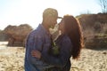 Happy african loving couple hugging outdoors at beach Royalty Free Stock Photo