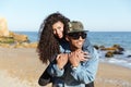 Happy african loving couple walking outdoors at beach Royalty Free Stock Photo