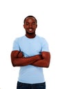 Happy african man standing with arms folded Royalty Free Stock Photo