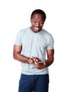 Happy african man using smartphone Royalty Free Stock Photo