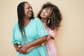 Happy african mother and daughter hugging each others - Love and family concept Royalty Free Stock Photo