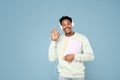 Happy african student posing in studio Royalty Free Stock Photo