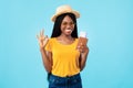 Happy African Woman Holding Travel Tickets Posing Over Blue Background