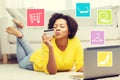 Happy african woman with laptop and credit card Royalty Free Stock Photo