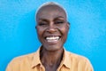 Happy African woman portrait - Afro senior female having fun smiling in front of camera