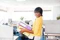 Happy afro american businesswoman holding folders Royalty Free Stock Photo