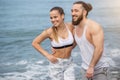 Happy afro american couple having fun together on a beach Royalty Free Stock Photo