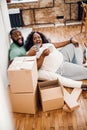 Excited family moving into new flat stock photo